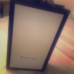 Gucci shopping bag.